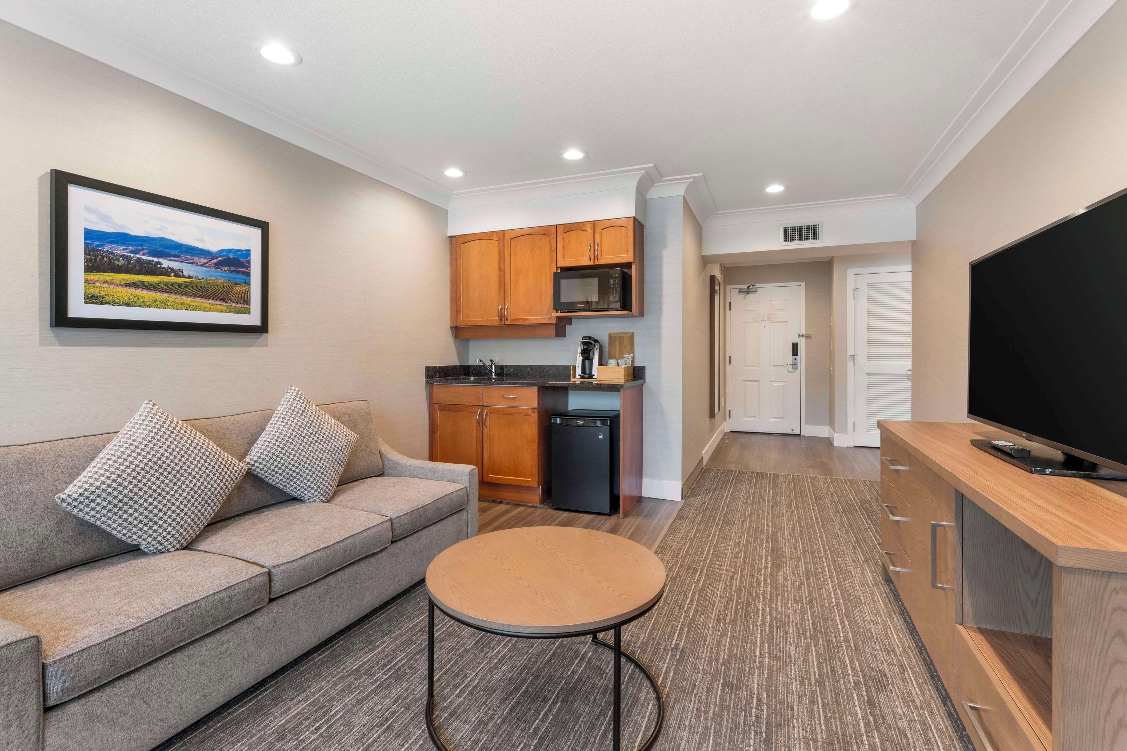 suite, 2 queen beds, non smoking (living room) | premium bedding, desk, laptop workspace, blackout curtains