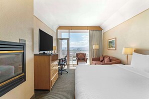 Premium bedding, desk, laptop workspace, blackout curtains