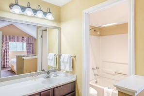 Suite, Multiple Beds, Non Smoking (Two-Bedroom, Loft) | Bathroom | Combined shower/bathtub, free toiletries, hair dryer, towels