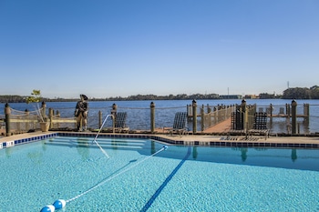 Outdoor pool, sun loungers at Bryan