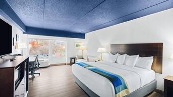 Hypo-allergenic bedding, desk, laptop workspace, blackout curtains