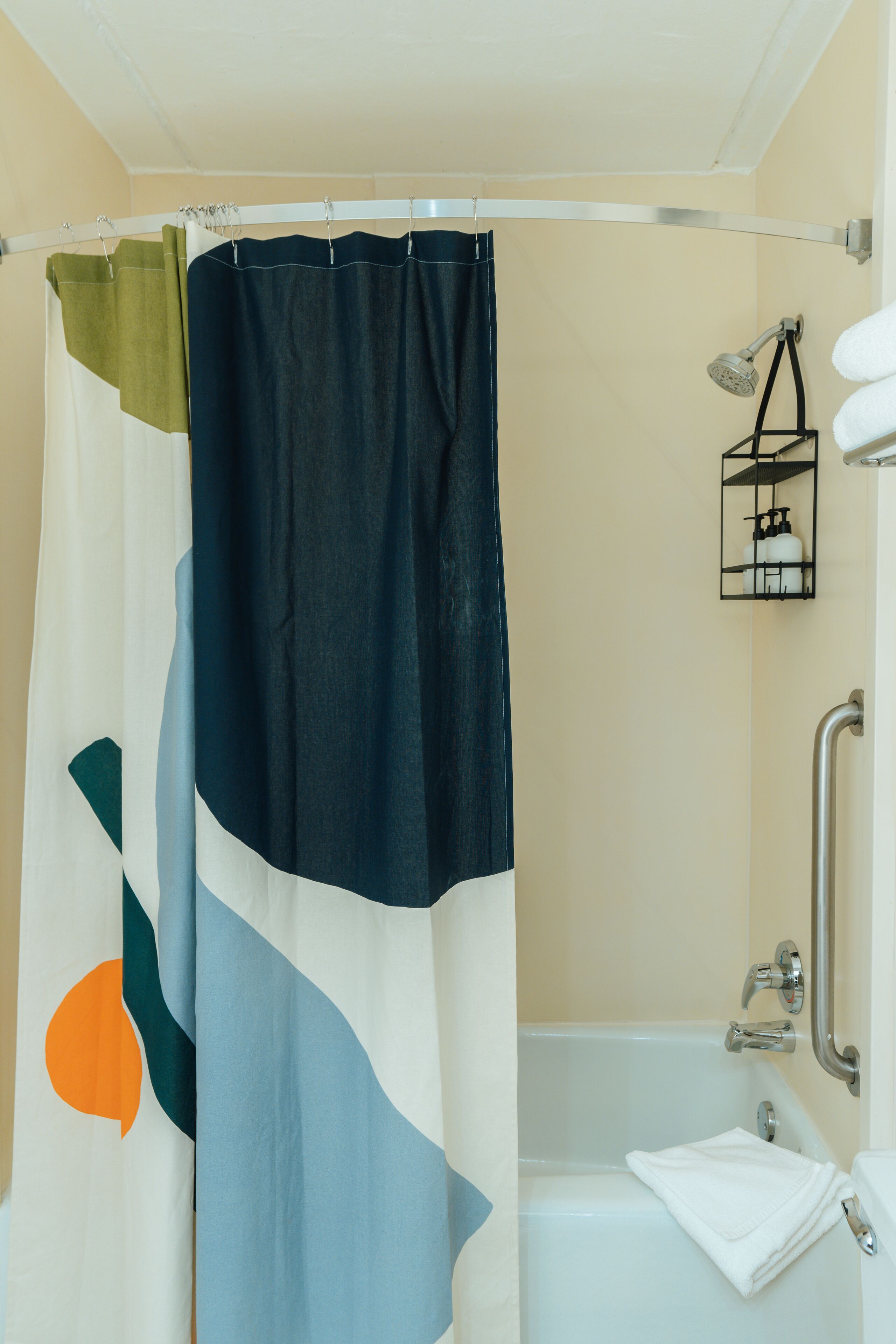 combined shower/bathtub, eco-friendly toiletries, hair dryer, towels