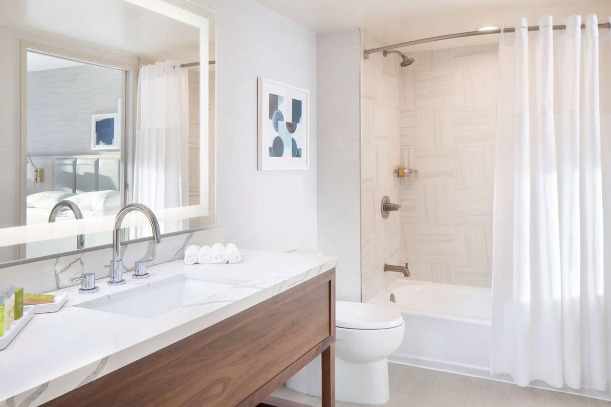 eco-friendly toiletries, hair dryer, towels, soap