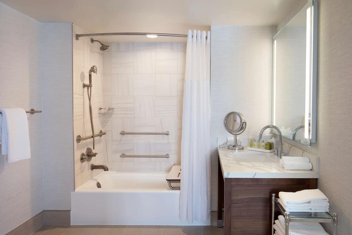 eco-friendly toiletries, hair dryer, towels, soap