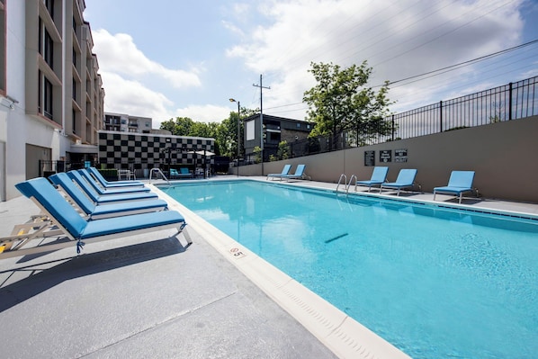 Outdoor pool, open 9:00 AM to 10:00 PM, sun loungers