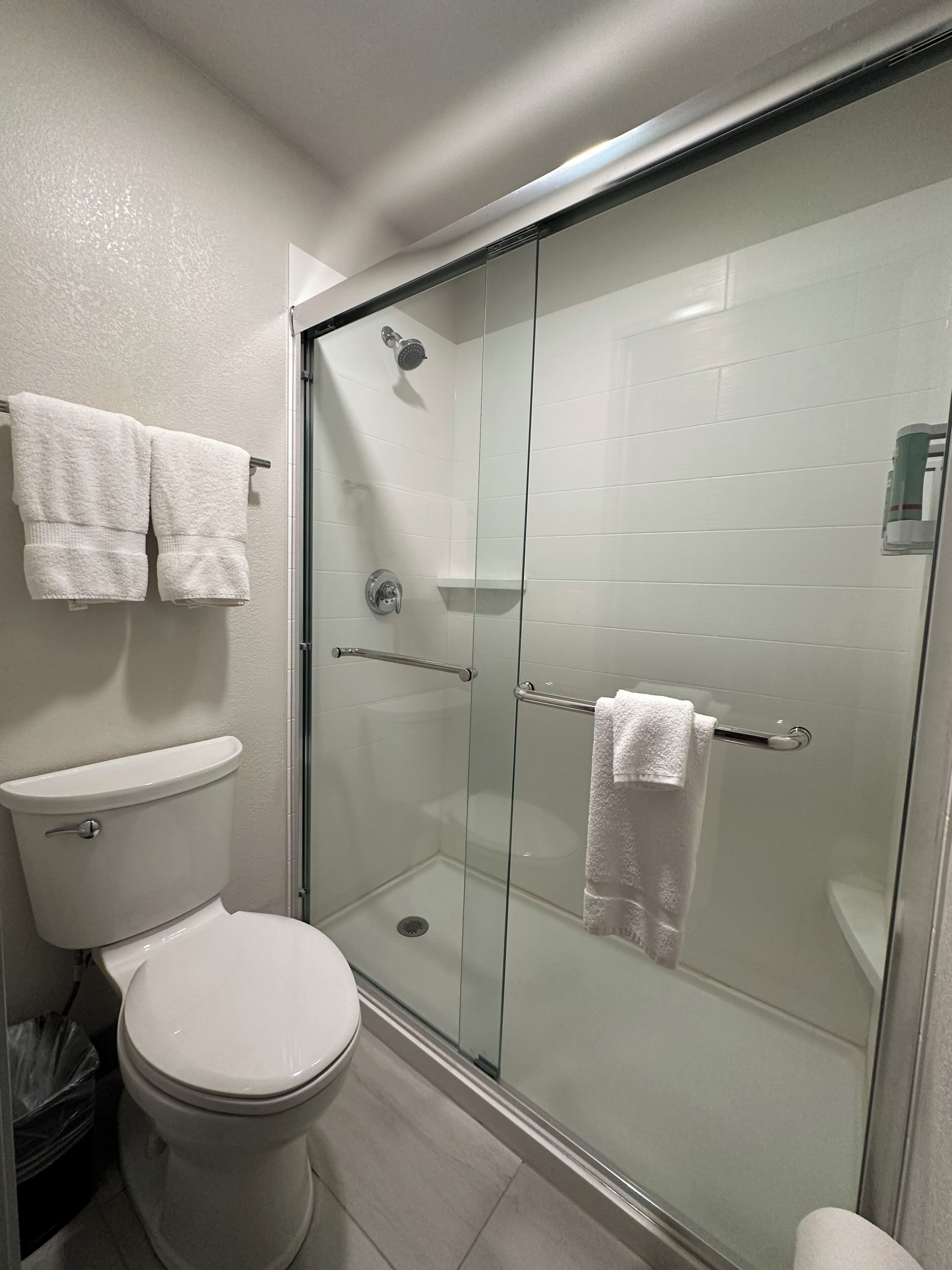 standard room, multiple beds, non smoking, refrigerator & microwave (1st floor) | bathroom | combined shower/bathtub, hair dryer, towels