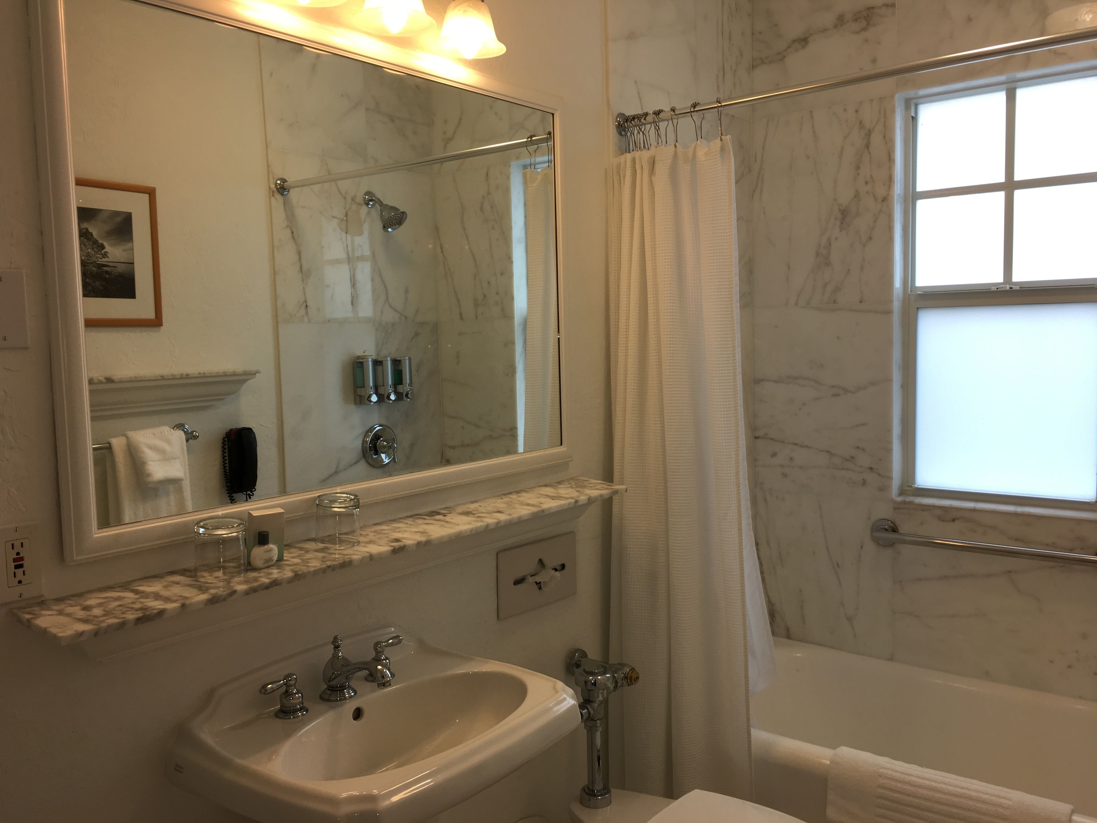superior room, 1 king bed | bathroom | eco-friendly toiletries, hair dryer, towels
