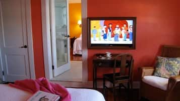 Televisión de pantalla plana y estación para iPod