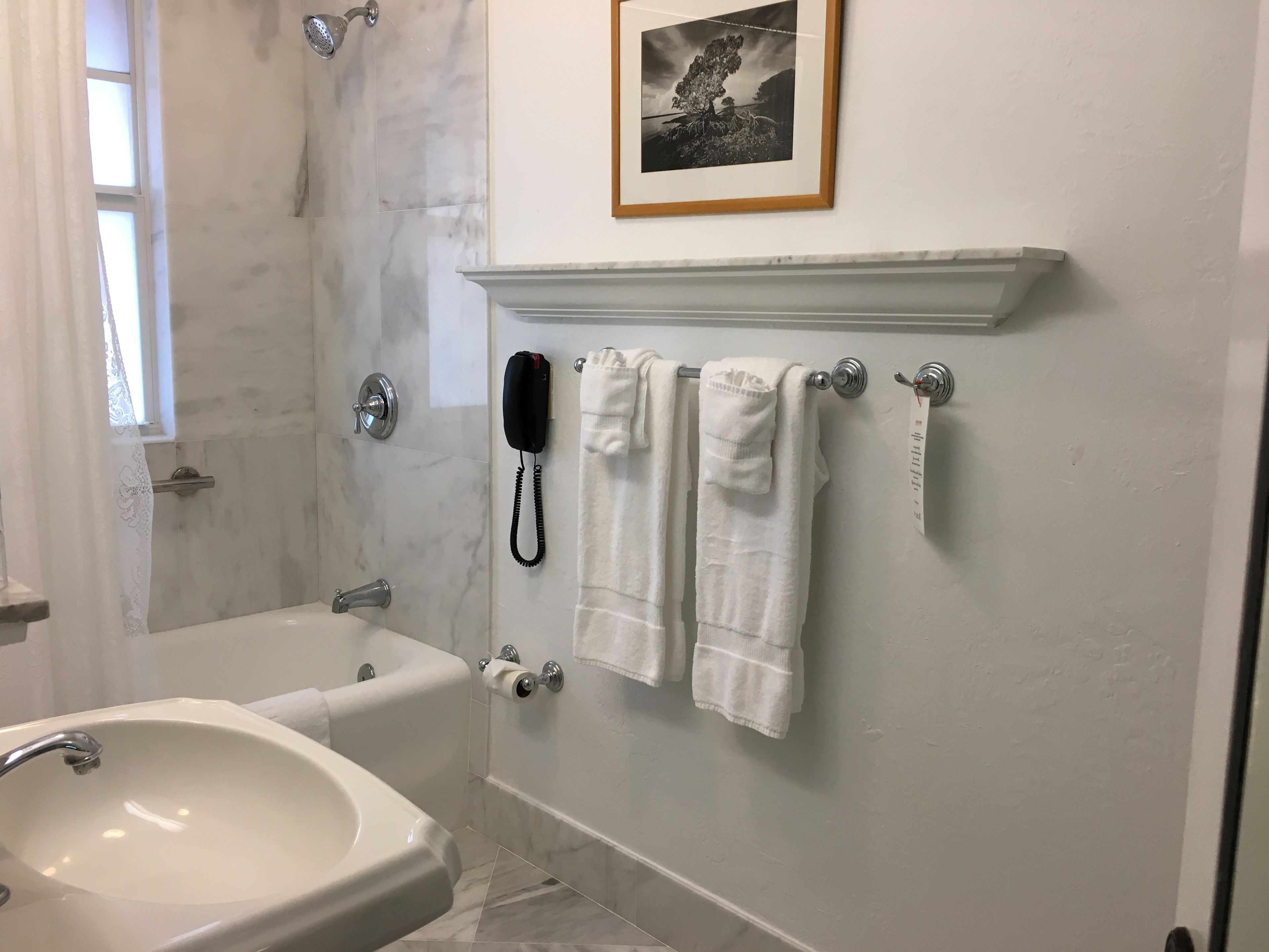 historic queen room | bathroom | eco-friendly toiletries, hair dryer, towels
