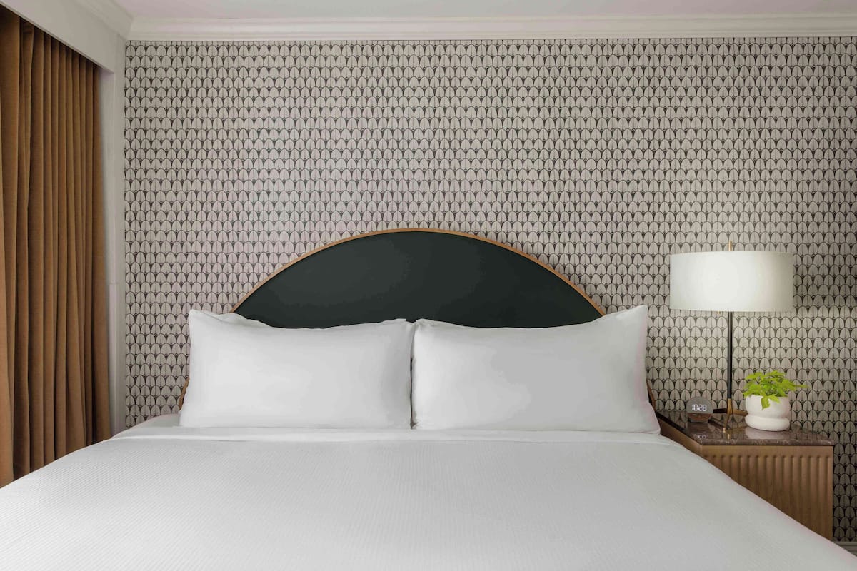 Premium bedding, down duvets, pillow-top beds, in-room safe