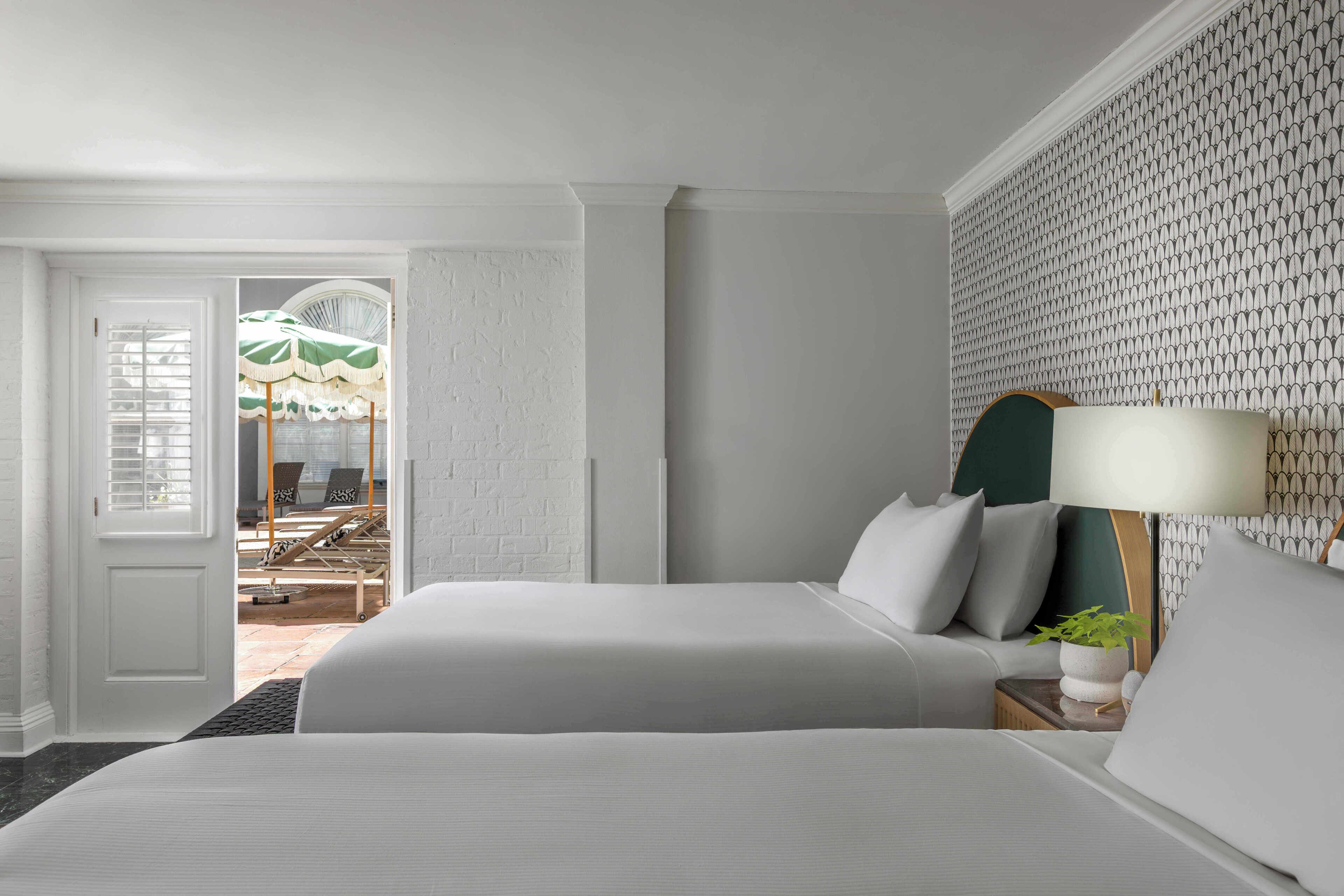 deluxe room, 2 queen beds (deluxe poolside courtyard two queens) | premium bedding, down duvets, pillow-top beds, in-room safe