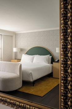 Room, 1 King Bed, Accessible (Deluxe King ADA Guestroom) | Living area | 42-inch flat-screen TV with cable channels, TV, iPod dock at Bourbon Orleans Hotel