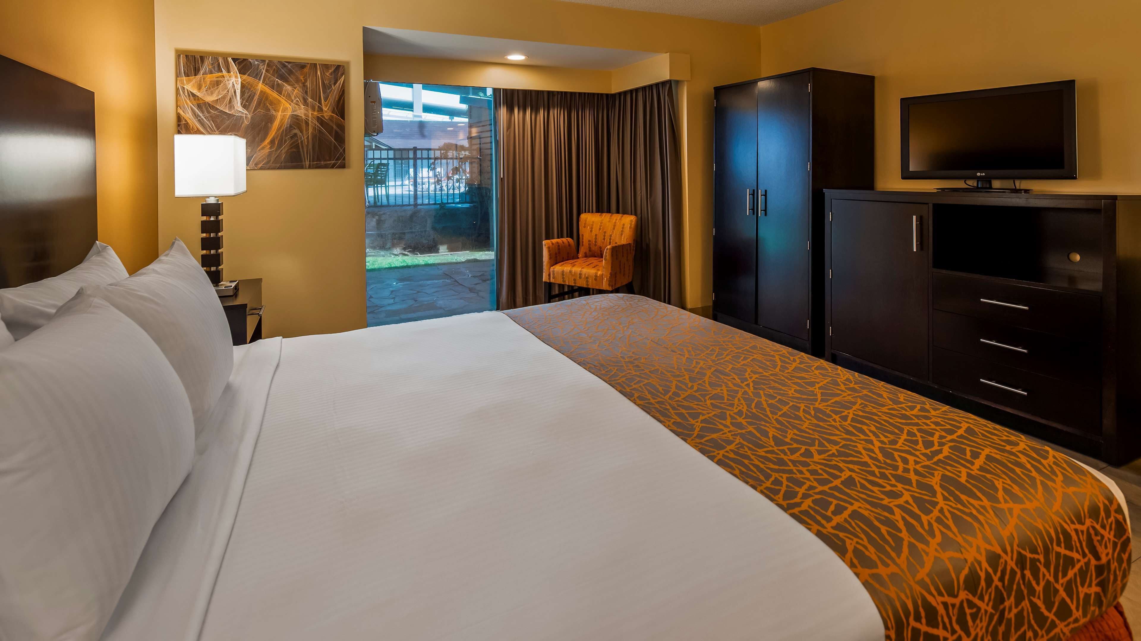 desk, laptop workspace, blackout curtains, iron/ironing board