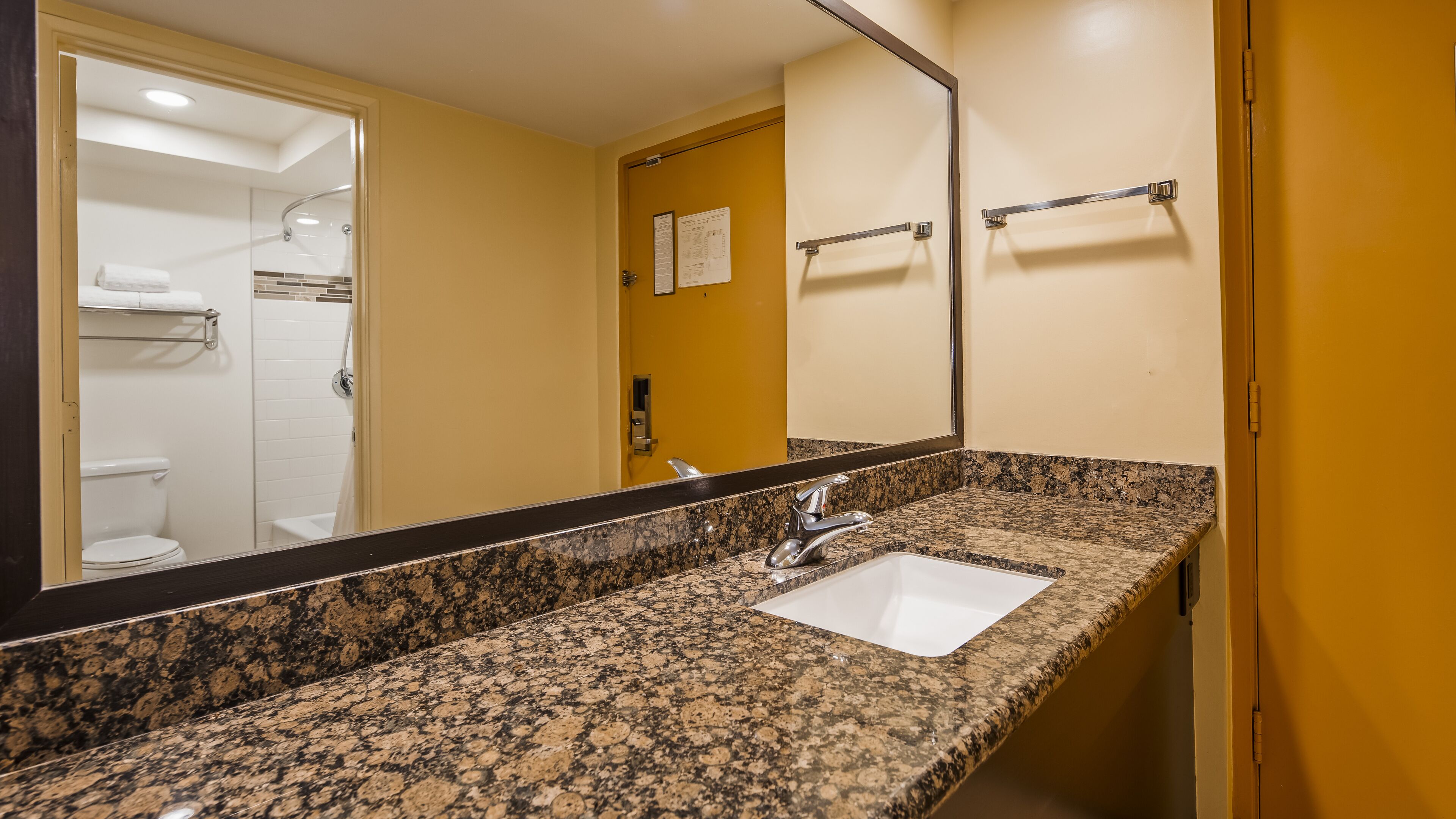 desk, laptop workspace, blackout curtains, iron/ironing board