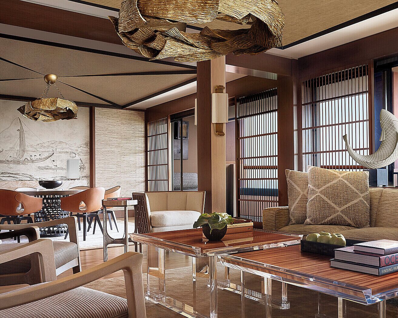 A modern living room with a wooden coffee table, a sofa, and a dining area with chairs.