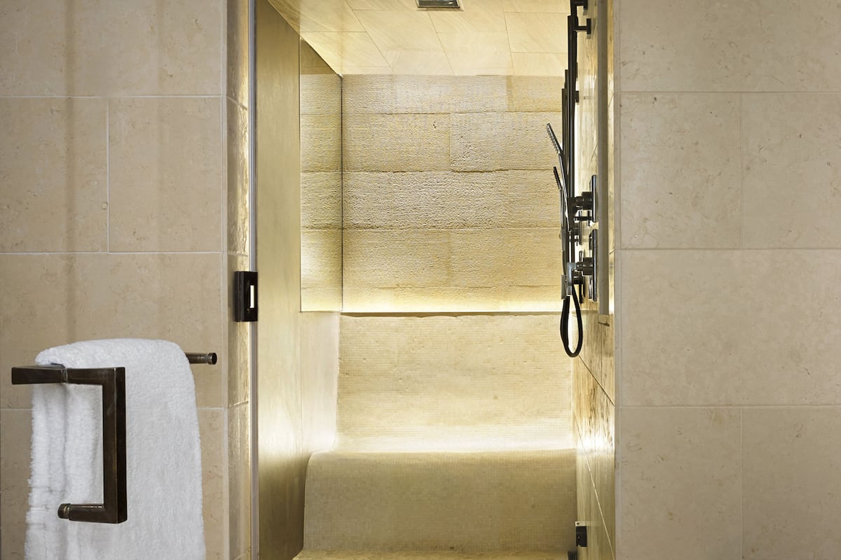 separate bathtub and shower, designer toiletries, hair dryer, bathrobes