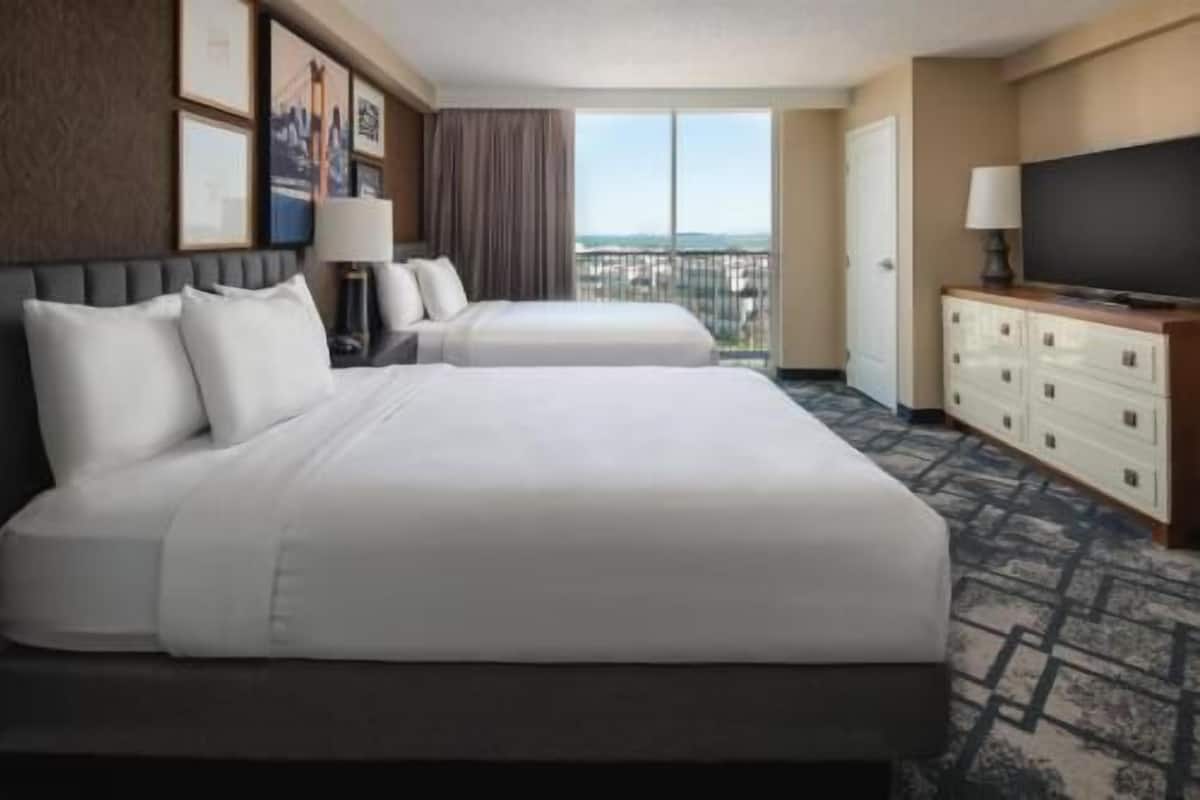 Premium bedding, down comforters, pillowtop beds, in-room safe