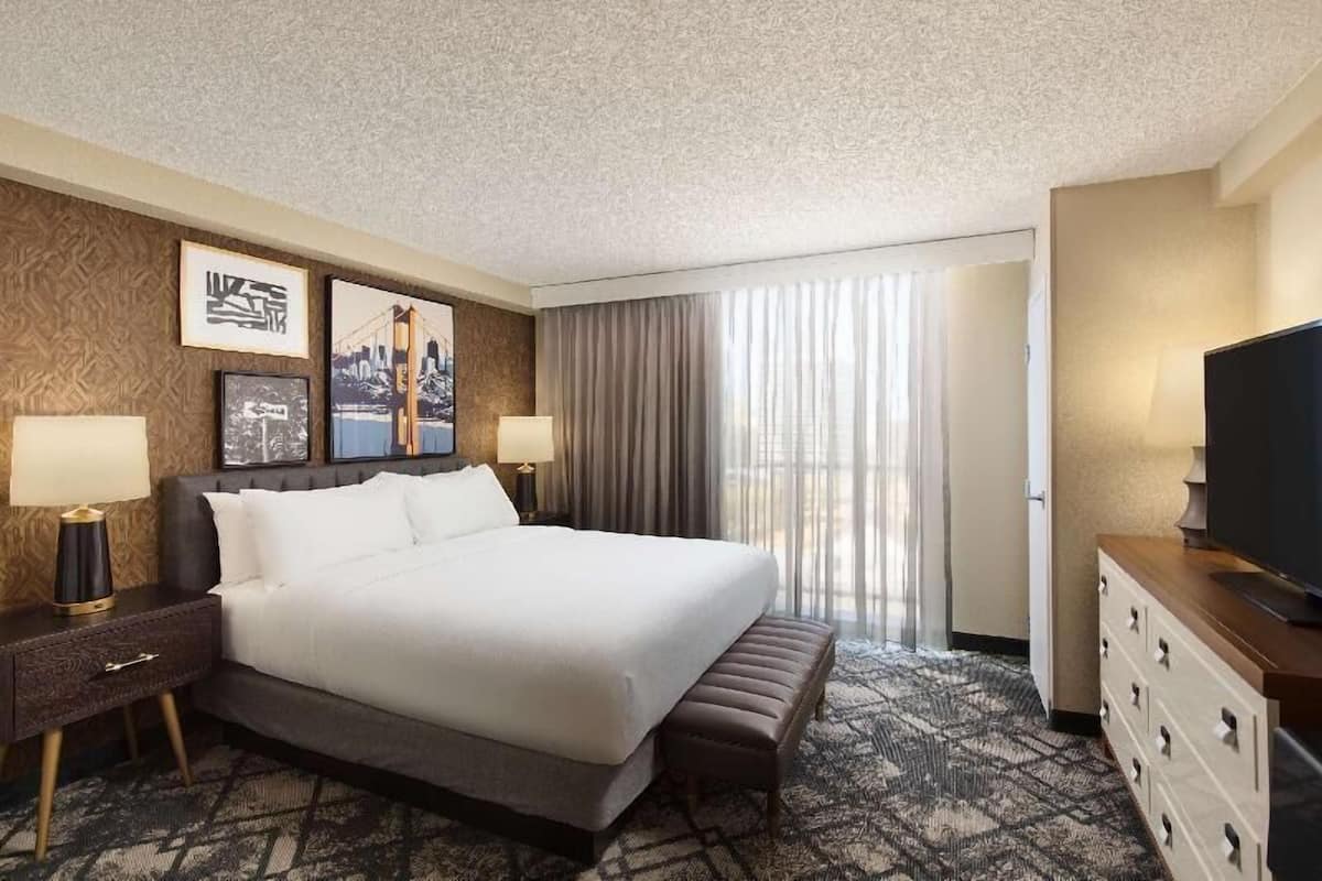 Premium bedding, down comforters, pillowtop beds, in-room safe