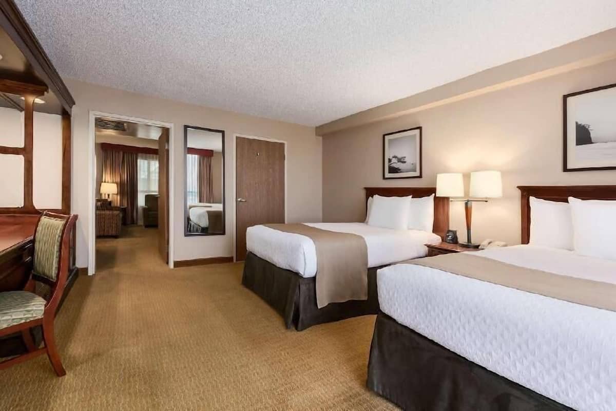 Premium bedding, down comforters, pillowtop beds, in-room safe