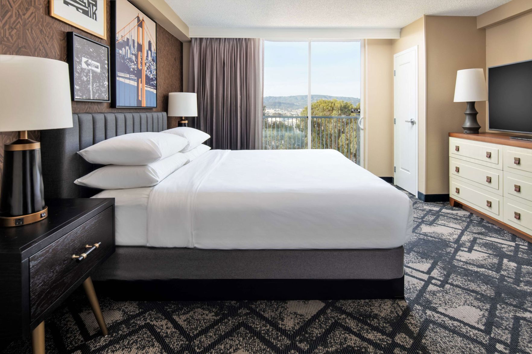 Premium bedding, down comforters, pillowtop beds, in-room safe