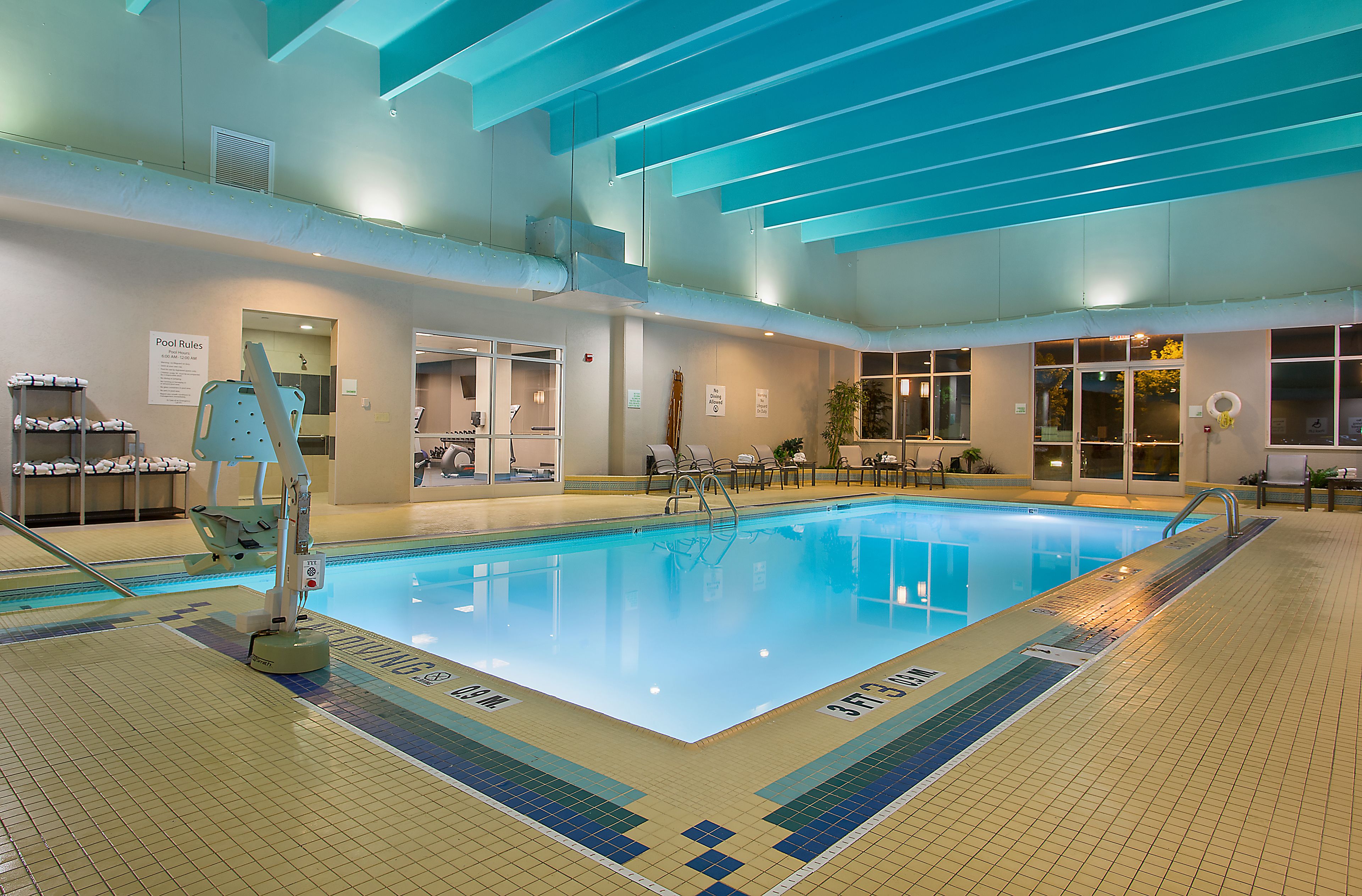 indoor pool, open 5 am to midnight, pool loungers