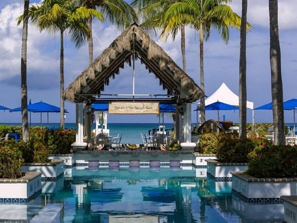Outdoor pool, pool umbrellas, sun loungers