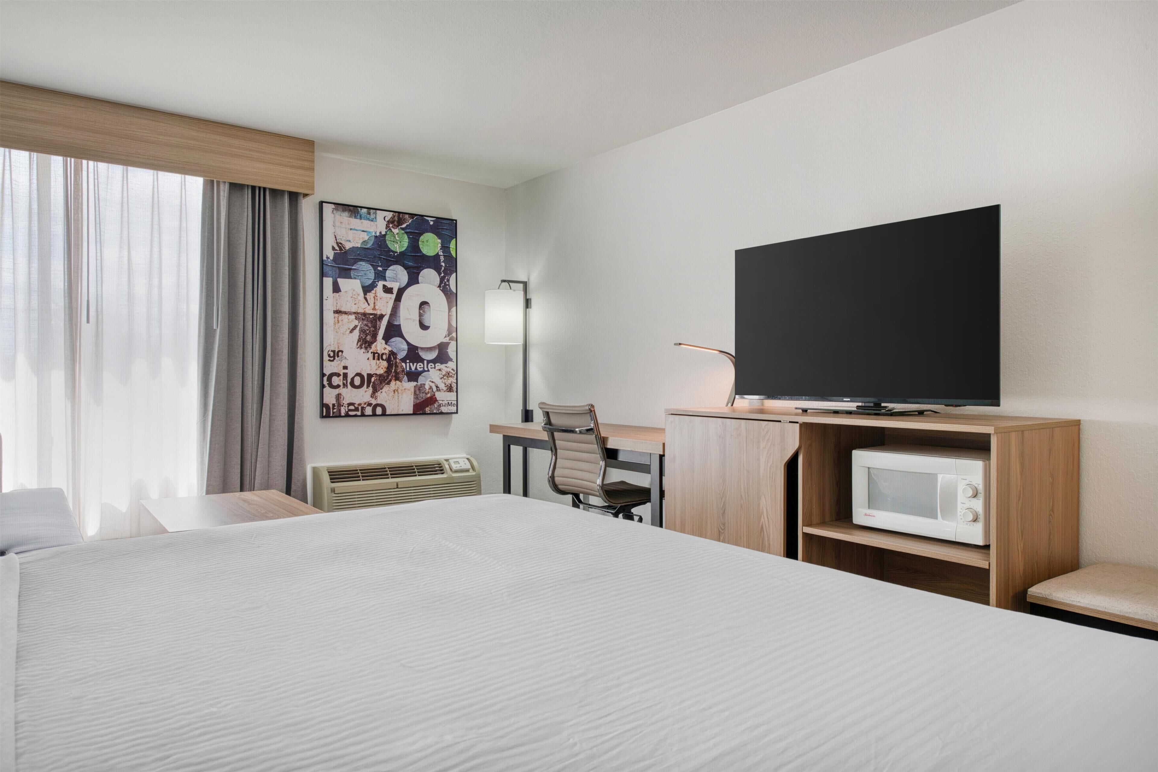 Desk, blackout curtains, iron/ironing board, free WiFi