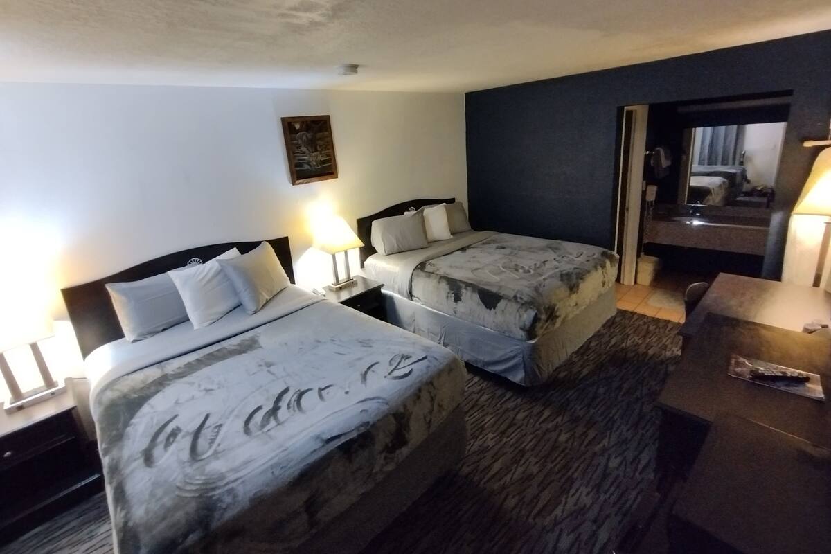 Double Room, 2 Queen Beds | Iron/ironing board, WiFi (free), bed sheets