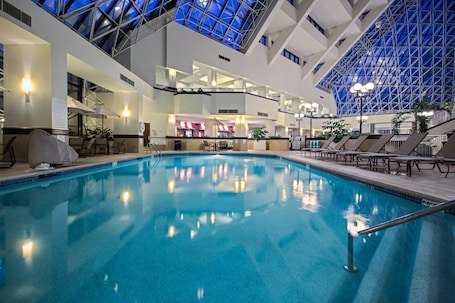 Indoor pool, open 6:00 AM to 9:00 PM, pool loungers. Crowne Plaza St. Louis Airport by IHG