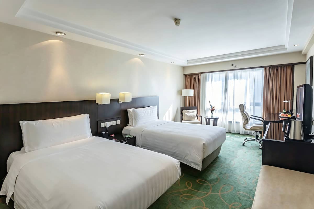 Deluxe Twin Beds Room | Premium bedding, down comforters, in-room safe, blackout drapes