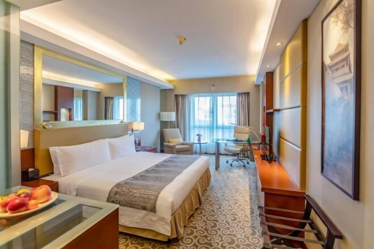Premium bedding, down duvets, in-room safe, desk