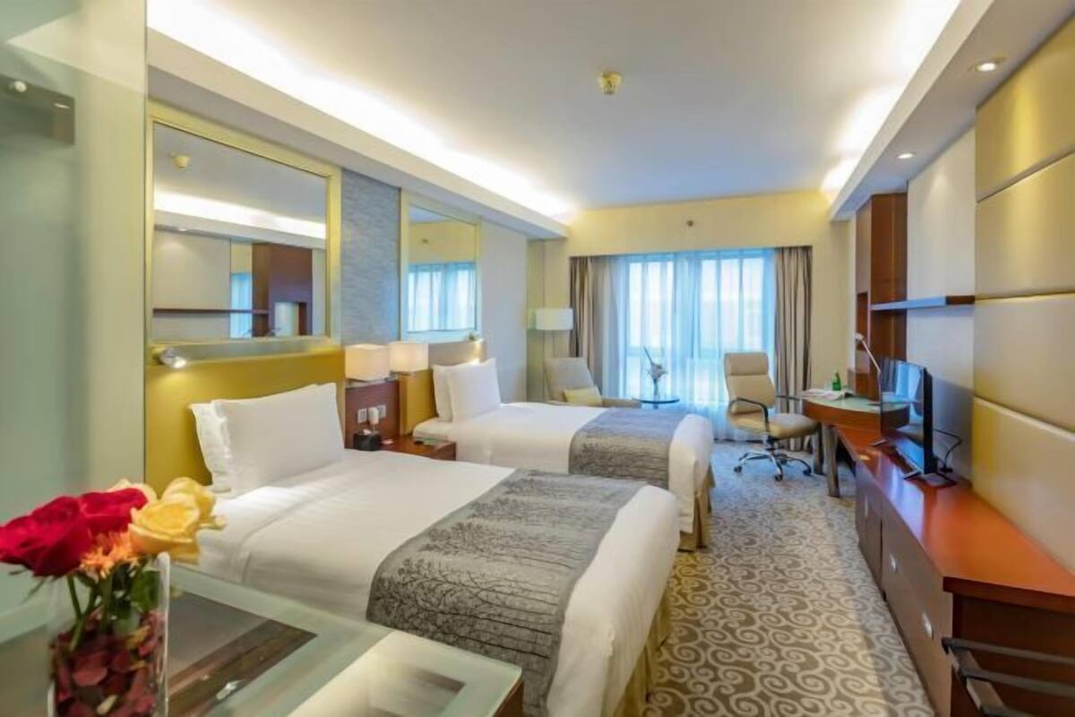 Premium bedding, down duvets, in-room safe, desk