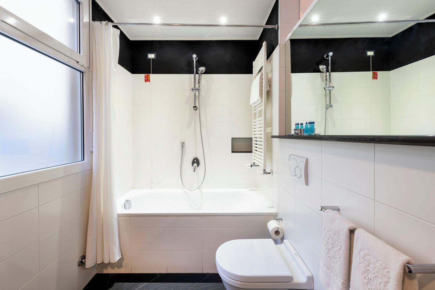classic room | bathroom | eco-friendly toiletries, hair dryer, bidet, towels