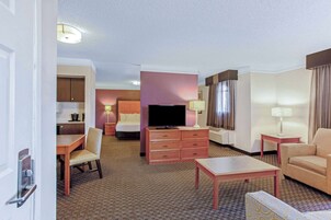 Suite, 1 King Bed, Non Smoking | Premium bedding, desk, iron/ironing board, WiFi (free)