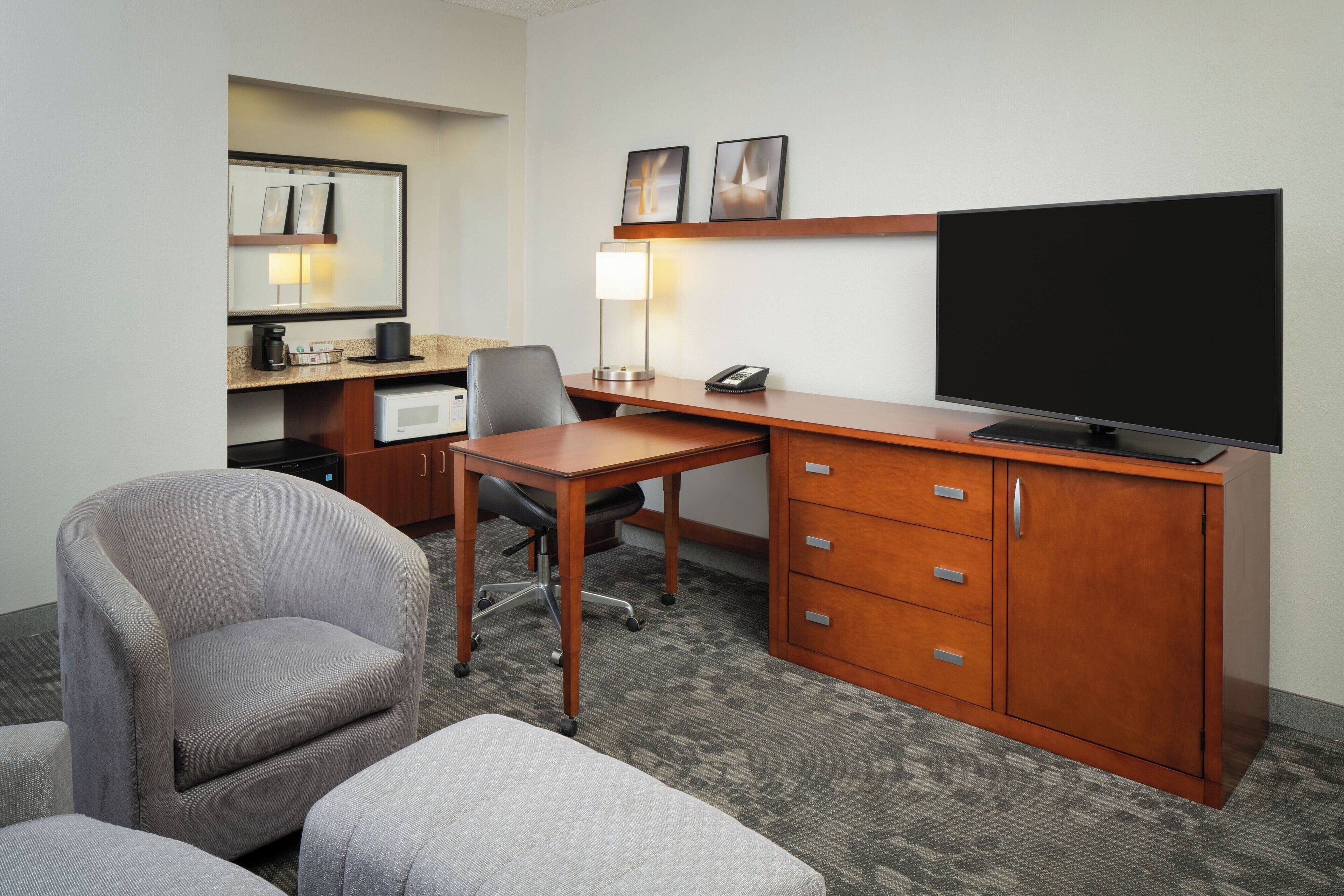 suite, 1 bedroom, balcony | 1 bedroom, desk, laptop workspace, iron/ironing board