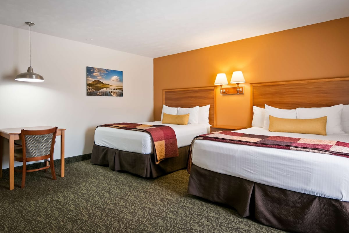 standard room, 2 queen beds, non smoking, refrigerator & microwave | minibar, desk, soundproofing, iron/ironing board