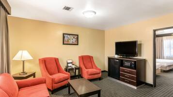 Suite – 2 Queens | Living area | 42-inch LCD TV with cable channels, TV