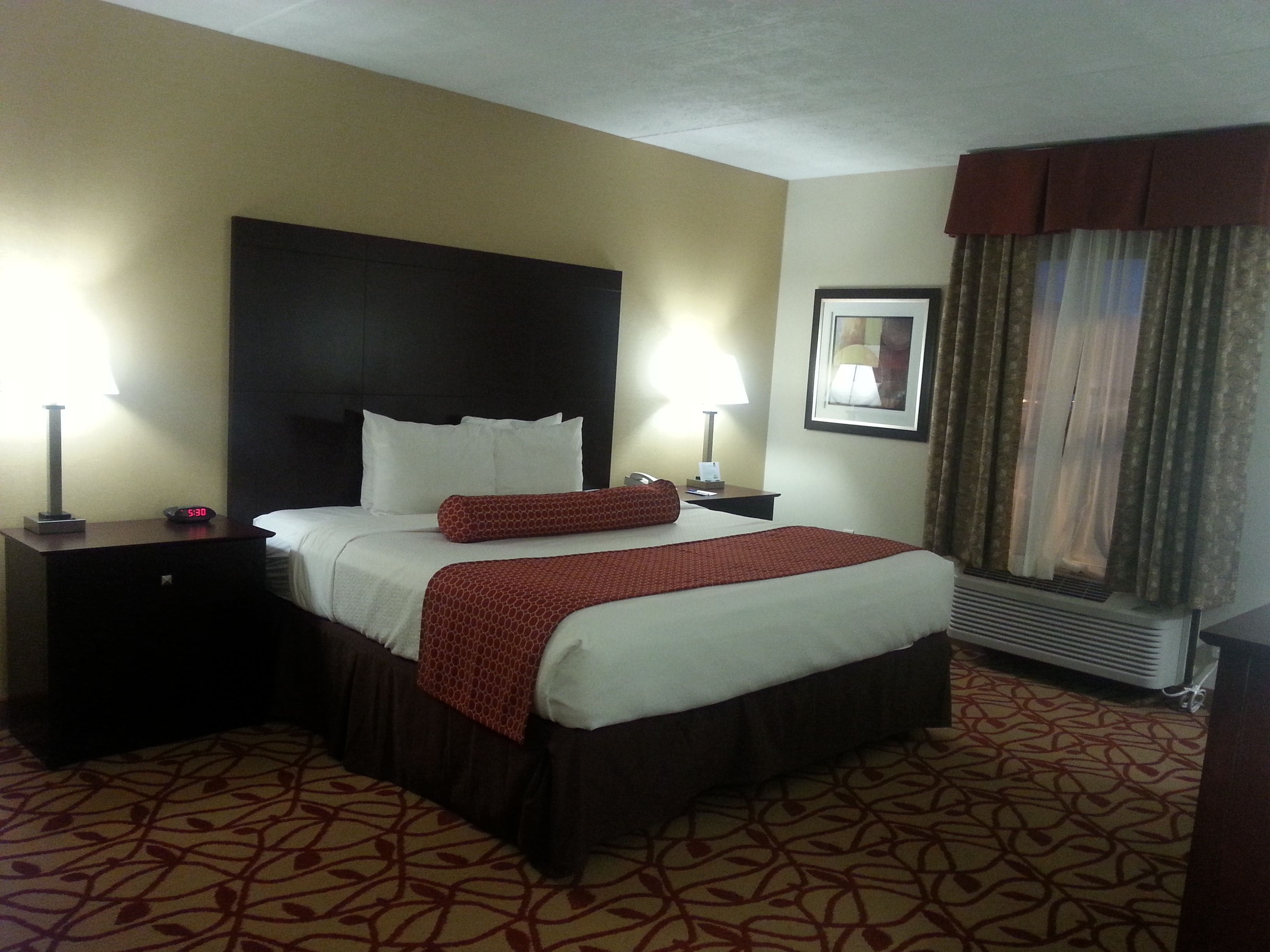 desk, laptop workspace, blackout curtains, iron/ironing board