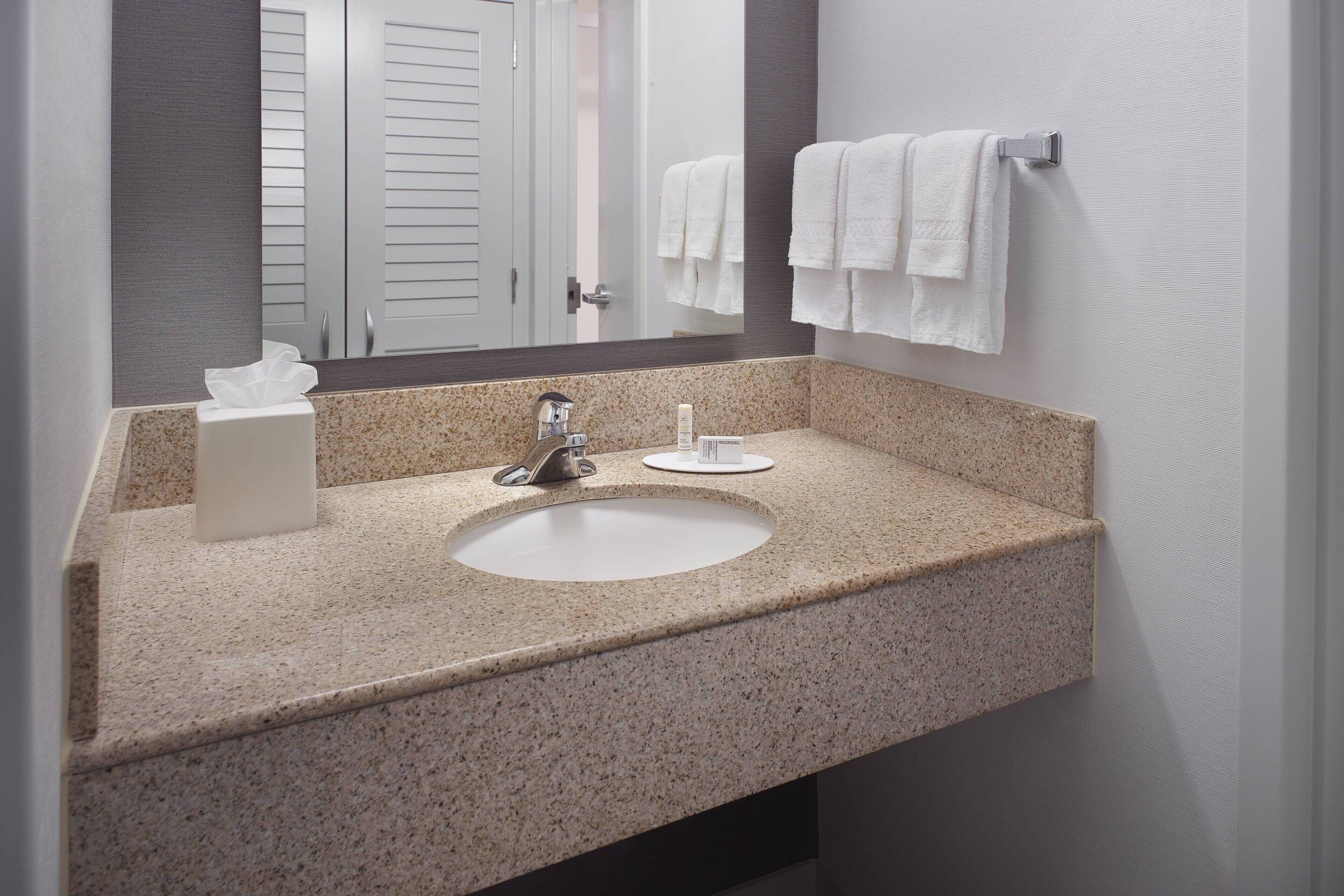 combined shower/bathtub, eco-friendly toiletries, hair dryer, towels