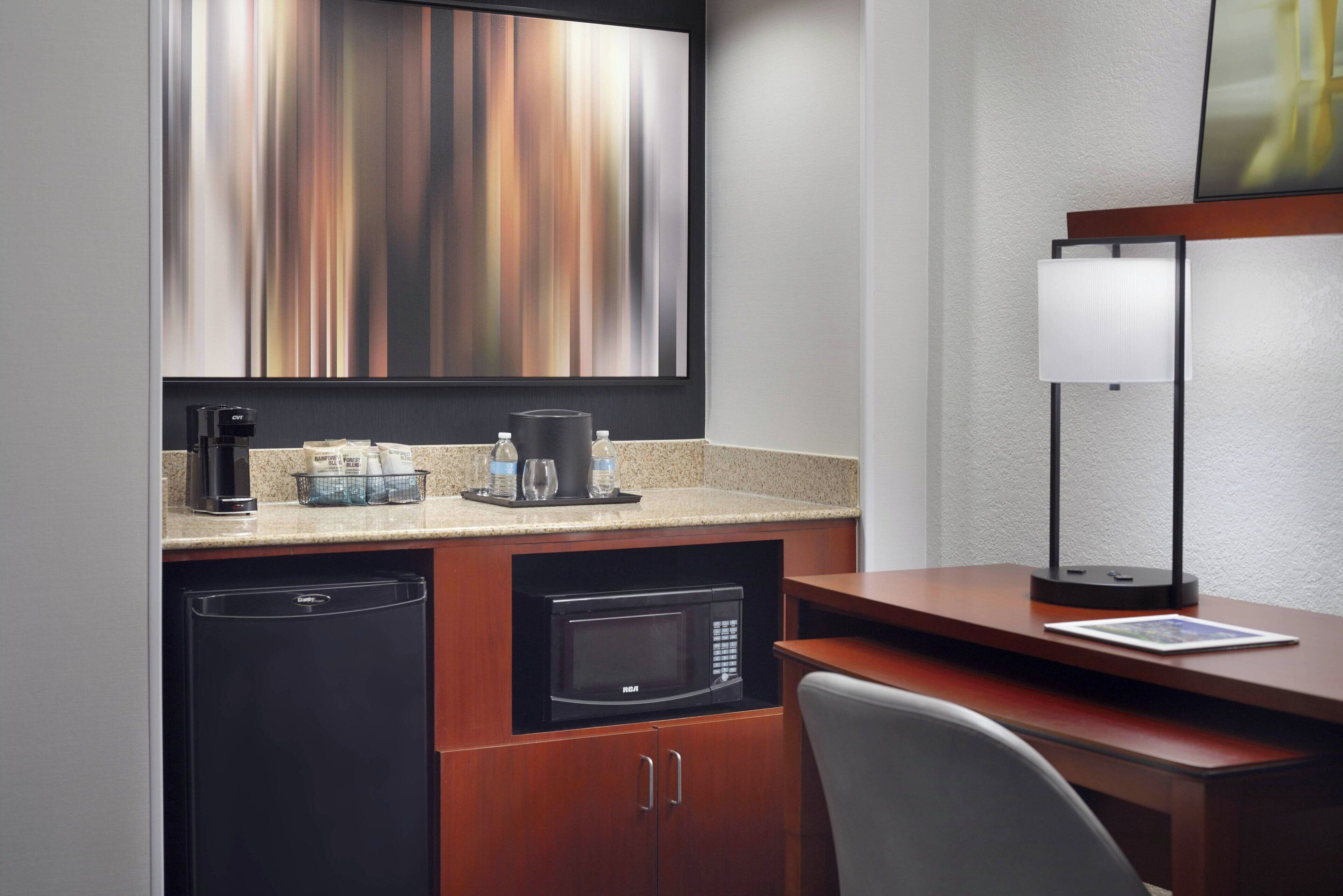 premium bedding, desk, laptop workspace, iron/ironing board