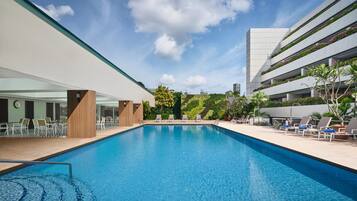 Outdoor pool, pool umbrellas, sun loungers