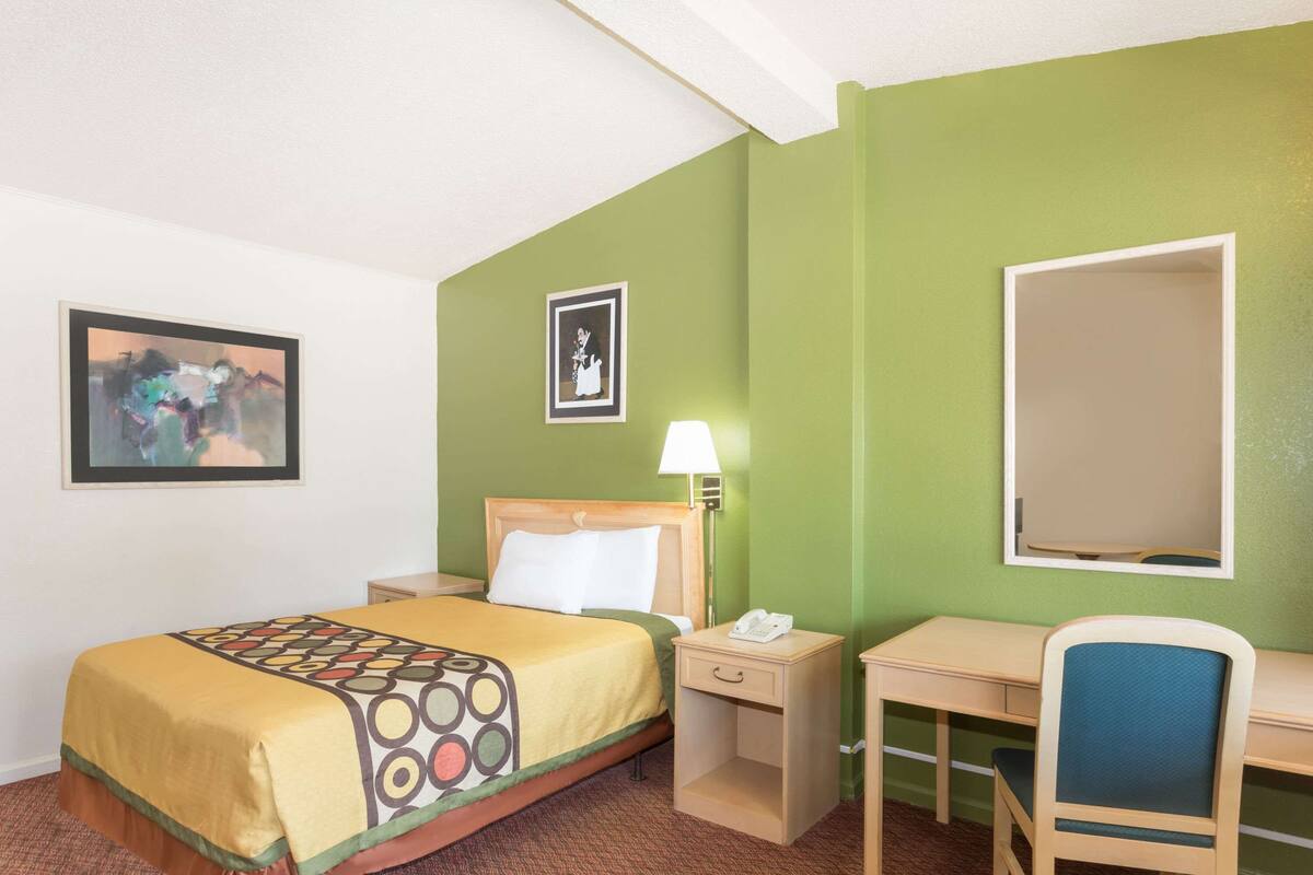 Room, 1 Queen Bed | Laptop workspace, blackout drapes, bed sheets
