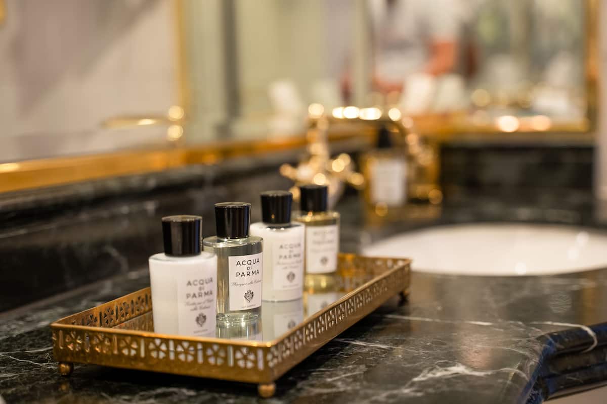 separate bathtub and shower, designer toiletries, hair dryer, bathrobes