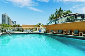 Outdoor pool, pool umbrellas, pool loungers