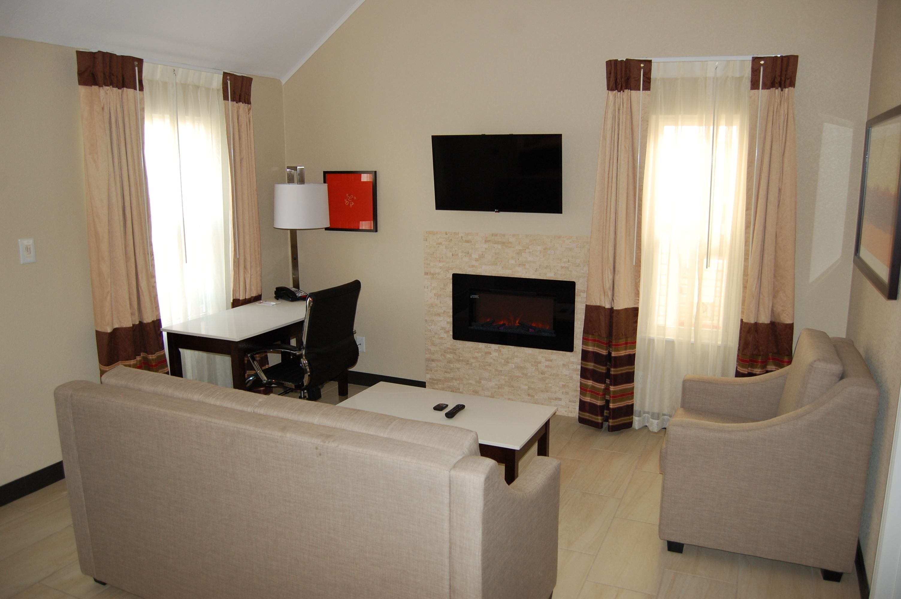 Suite, Multiple Beds, Non Smoking (Two Bedroom) | Living area | 40-inch flat-screen TV with digital channels, TV