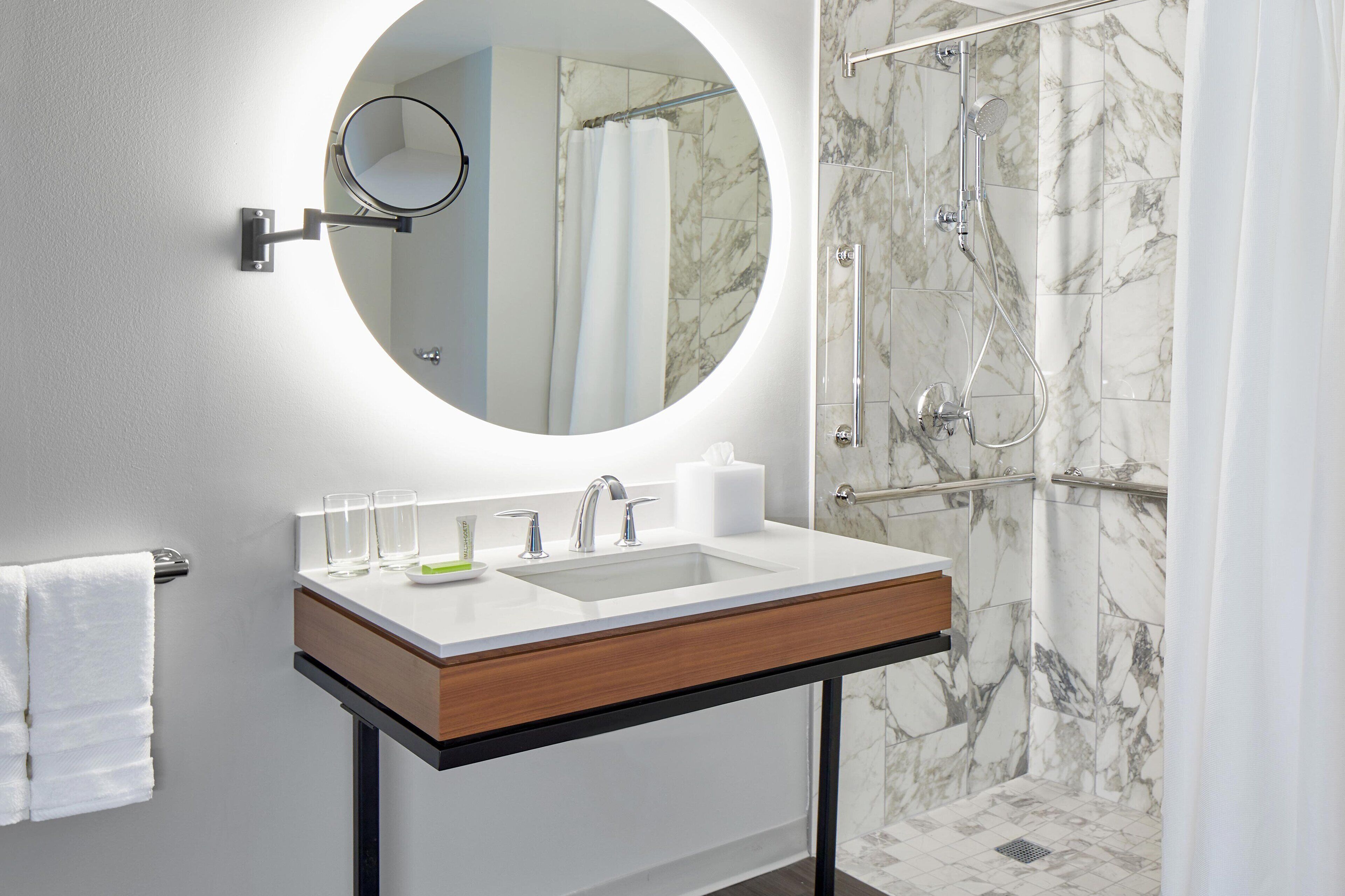 eco-friendly toiletries, hair dryer, towels