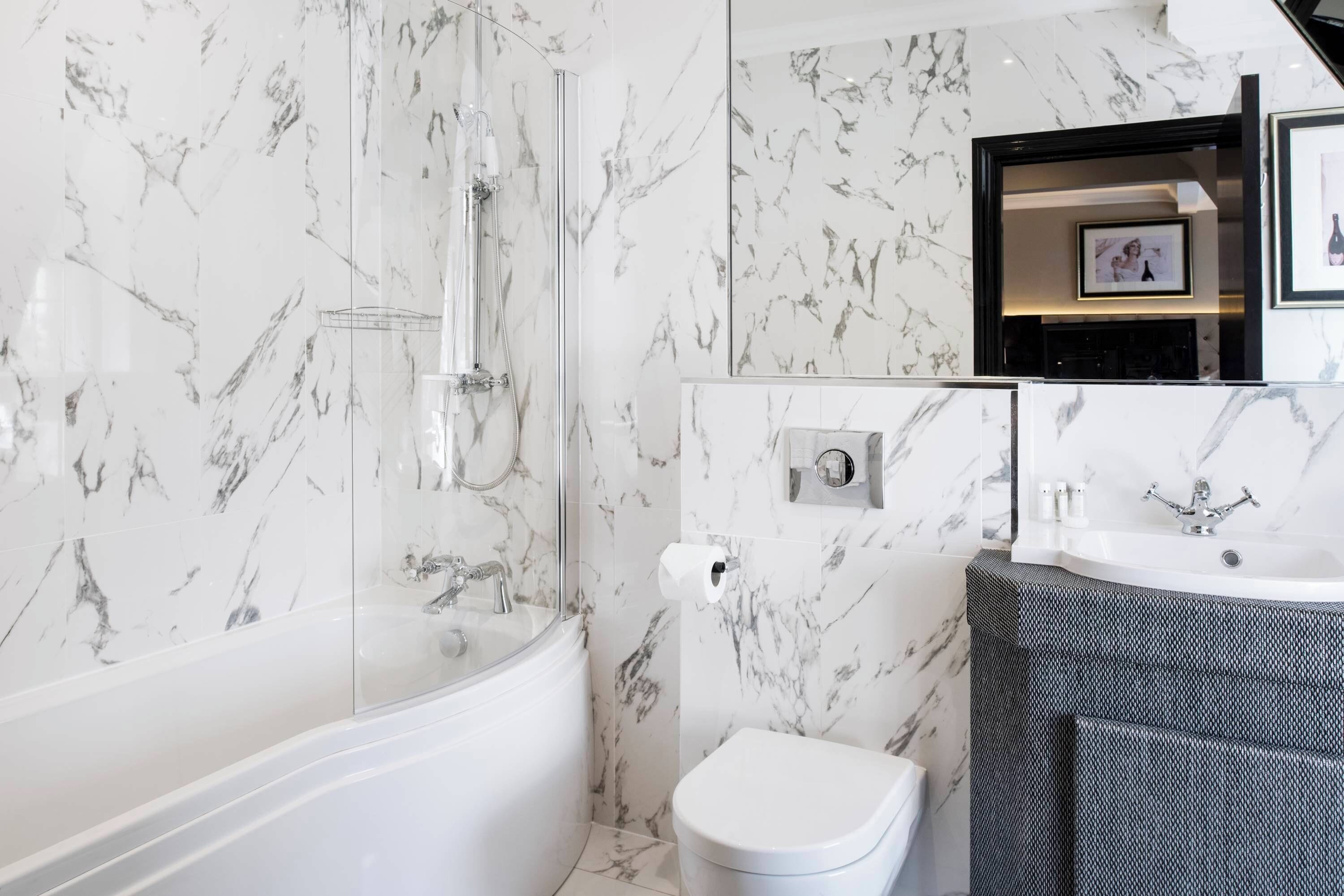 luxury penthouse | bathroom | shower, designer toiletries, hair dryer, towels