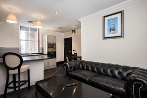 Luxury Apartment, 2 Bedrooms | Living area | TV