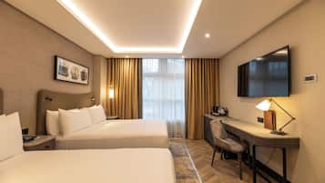 Deluxe-værelse - 2 dobbeltsenge | Pengeskab på værelset, skrivebord, arbejdsområde til bærbare computere