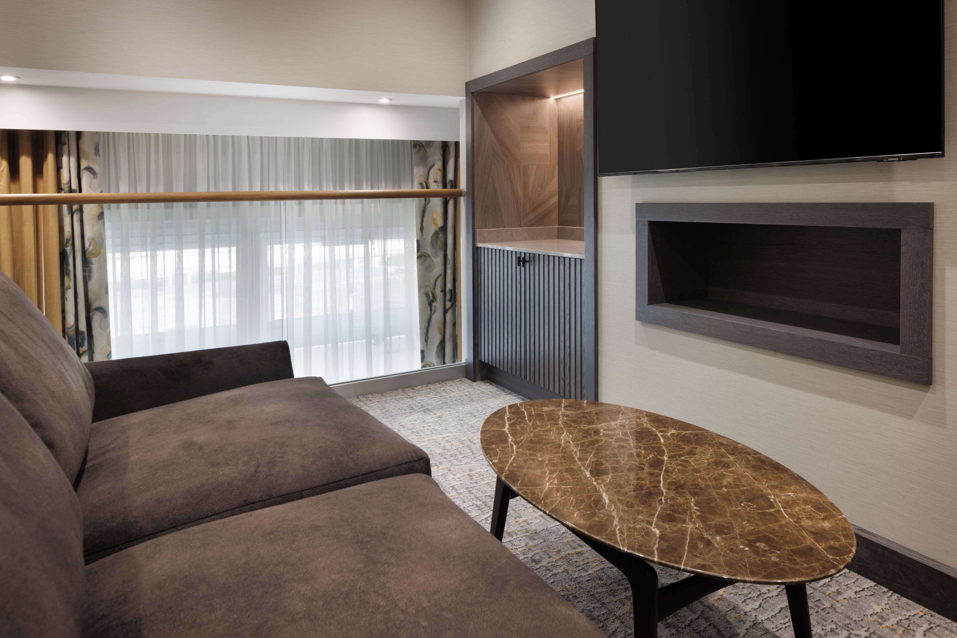 suite, 2 double beds | living area | lcd tv